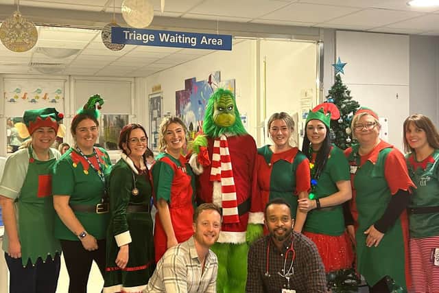 Staff on the children's ward with the Grinch for the Winter Wonderland fundraising event
