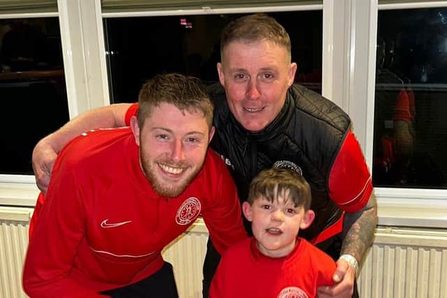 Parkgate man of the match Daniel Booth with Scott Mason and his son Luca.