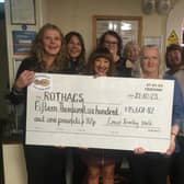 The Rothacs team accepting the cheque: front (from left): Jo McKinney, Gaynor Smith, counsellor Liz Thompson, Dr Anne Cooper. Back: Katie Hale, senior counsellor Susan Coldwell, external supervisor Teresa Greaves, treasurer Laraine Bisby.