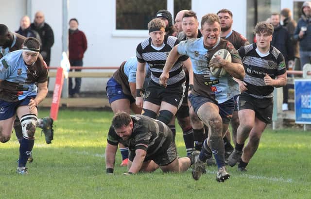 Rotherham Titans try scorer Harry Newborn makes a break against Otley. Pictures by GARETH SIDDONS