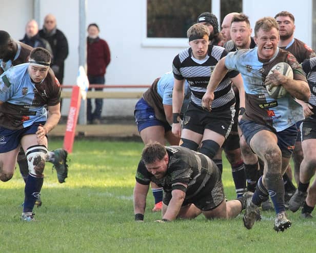 Rotherham Titans try scorer Harry Newborn makes a break against Otley. Pictures by GARETH SIDDONS