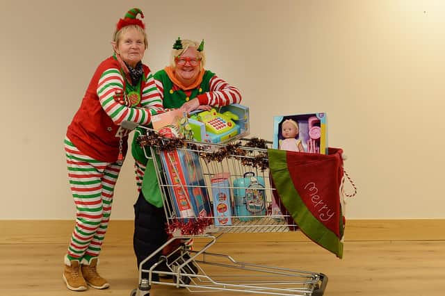 Rotherham Toy Appeal coordinator Ann Levick (right) and volunteer Joyce Ledger collecting donations at Parkgate Shopping