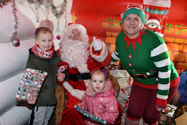 Meeting Santa and his elf at the Mexborough Christmas lights switch on were Bentley and Isla Allison.