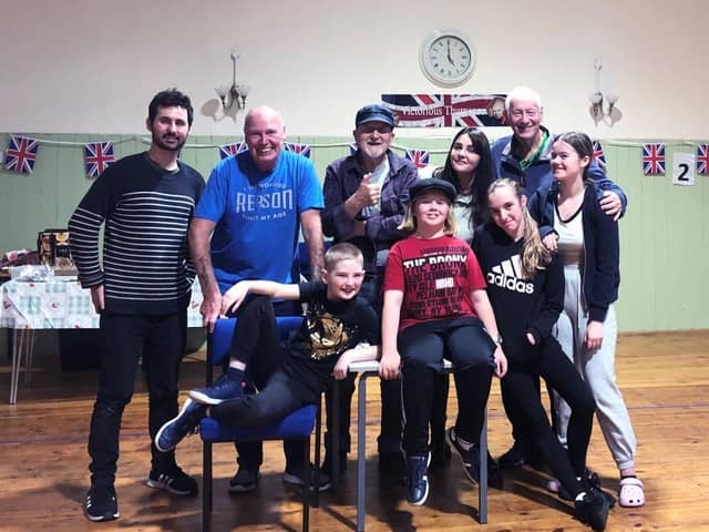 IN REHEARSAL: Back row, left to right: Alex Colley (narrator); Jeff Riley (Rabbit); Martin Riley, writer; Hayley Mitchell (narrator); and Tim Rutherford (Grandad). Front row, left to right: Joe Easton (Jake), Quinn Plews (Jake); Maisie Boyd (Megan); Kira Powell (Megan).