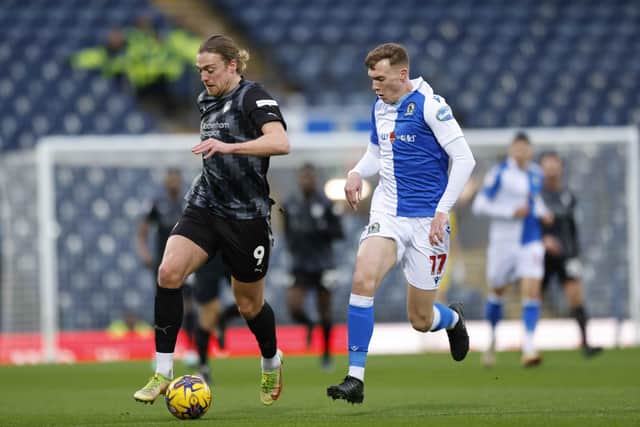 Tom Eaves breaks forward for Rotherham United in the first half at Blackburn Rovers. Picture: Jim Brailsford