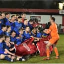 Parkgate FC celebrate their title win after the victory away to Wombwell Town. Pictures by Lee Hopkinson