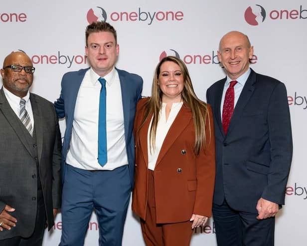 From left: One by One trustee Douglas Williams, co-founder Matthew Murray, chief executive and founder Becky Murray and MP John Healey