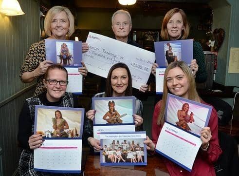 Photographer Roy Wooding is pictured with some of the models who took part - from left to right are, back: Kay Cooper and Sharon Martin and front: Lisa Freebury, Gill Heptinstall and Amy Naylor. Photo = Kerrie Beddows