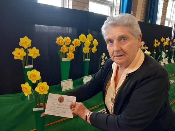 Final flourish: Winner Christine Yeardley with her award winning blooms