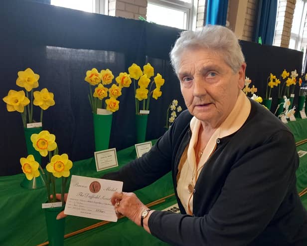 Final flourish: Winner Christine Yeardley with her award winning blooms