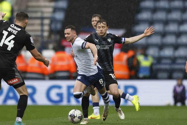 Ollie Rathbone battles for Rotherham United in the early rain at Deepdale during the Championship encounter with Preston North End. Picture: Jim Brailsford