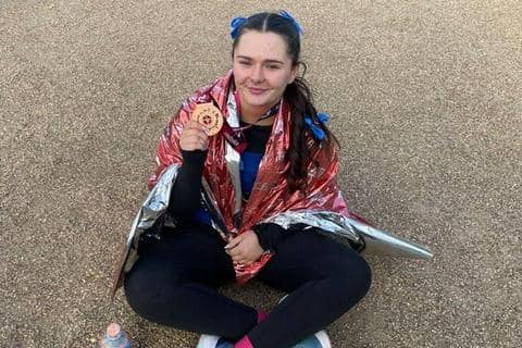 RACE: Skye Liversidge of Whiston with her medal for completing the London Marathon