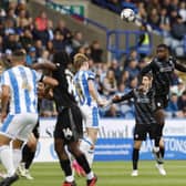 Hakeem Odoffin wins a first-half header for Rotherham United at Huddersfield Town in the Championship clash. Picture: Jim Brailsford