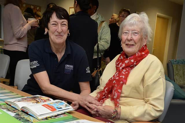 Care support worker Anne Daley (left) and service user Carol Harding at Crossroads Care's recent dementia specialist day centre open day - photo by Kerrie Beddows