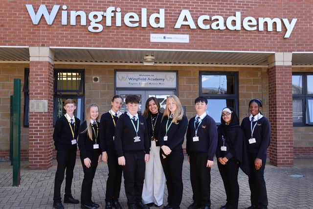 'SPECIAL PLACE': Head teacher Jordon O'Neill (centre) with some of the students at Wingfield Academy.