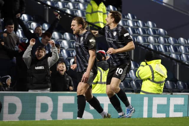 Tom Eaves celebrates in front of the Rotherham United fans after scoring for the Millers at Blackburn Rovers. Picture: Jim Brailsford