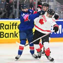 Germany-bound Liam Kirk battling against Canada. Photo by Dean Woolley