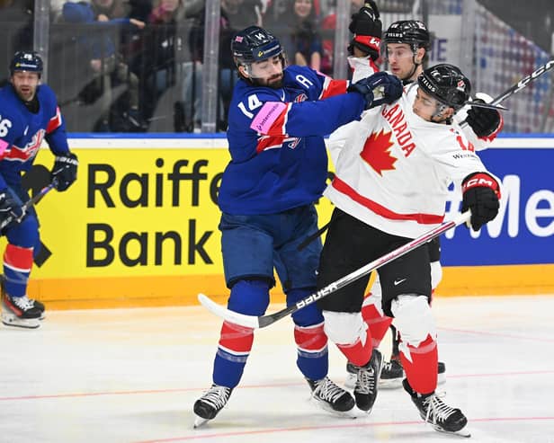 Germany-bound Liam Kirk battling against Canada. Photo by Dean Woolley