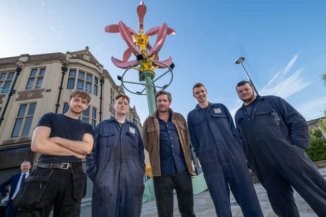 Camellia artist James Capper (centre) with apprentices from MTL Advanced Ltd who fabricated the sculpture, Alex Medlock, Lewis Clerkson, Warren Smith and Ross Doyle