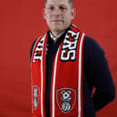 New Rotherham United head coach Leam Richardson shows off his Millers colours. Picture: Jim Brailsford