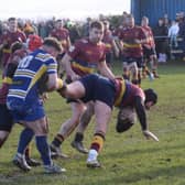 Dinnington's Jonny West tags a Wath raider in Saturday's first-v-second Yorkshire League derby. Pictures by Kerrie Beddows