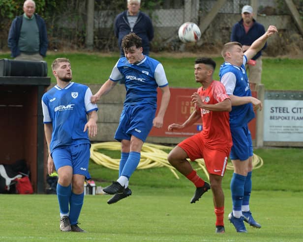 Swallownest (blue shirts) and Parkgate in action earlier this season