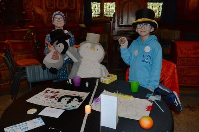 Harry Parker (left) and Noah Waring who ran Penguin Day and Annual Magical Day stalls at the recent Unique Stalls of Celebration event at Grimm & Co.