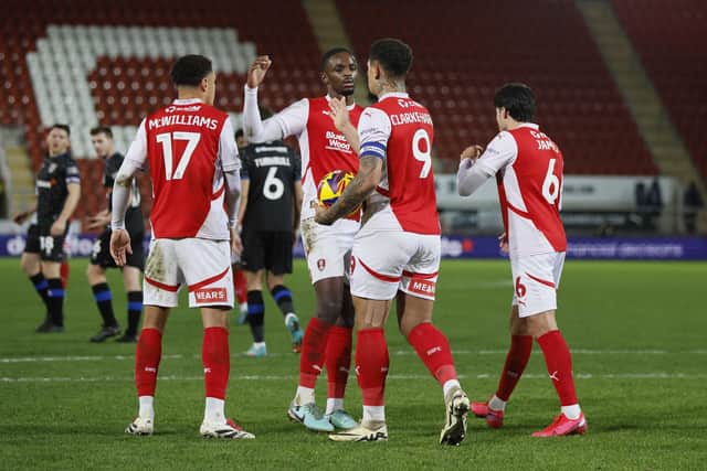 Celebrations after Jonson Clarke-Harris's opener in the Vertu Trophy win over Tranmere Rovers. Pic by Jim Brailsford