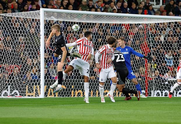 Sean Morrison (number 23) scores with a header for Rotherham United in a Carabao Cup second-round tie at Stoke City's bet365 Stadium. Picture: Jim Brailsford