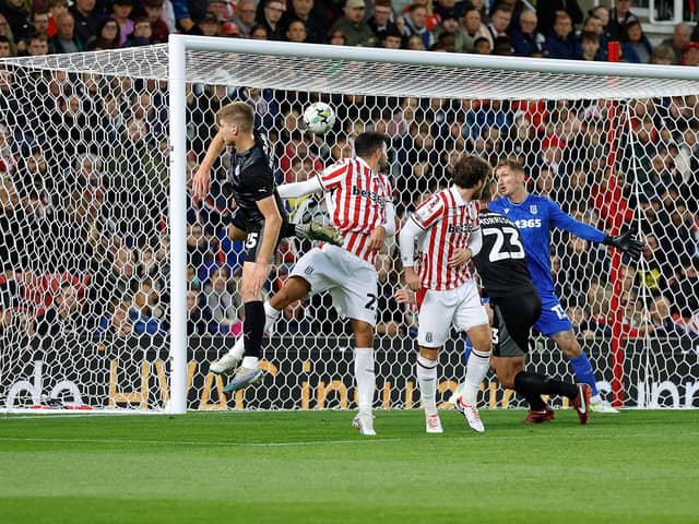 Sean Morrison (number 23) scores with a header for Rotherham United in a Carabao Cup second-round tie at Stoke City's bet365 Stadium. Picture: Jim Brailsford