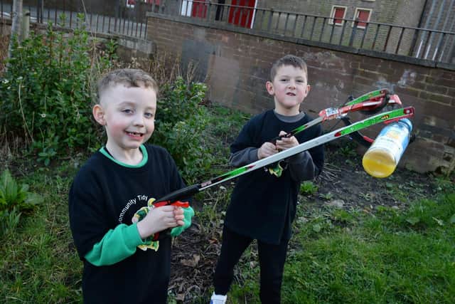 Litter picking youngsters at St John's Green Charlie Sharp (left) and Thomas Connelly.