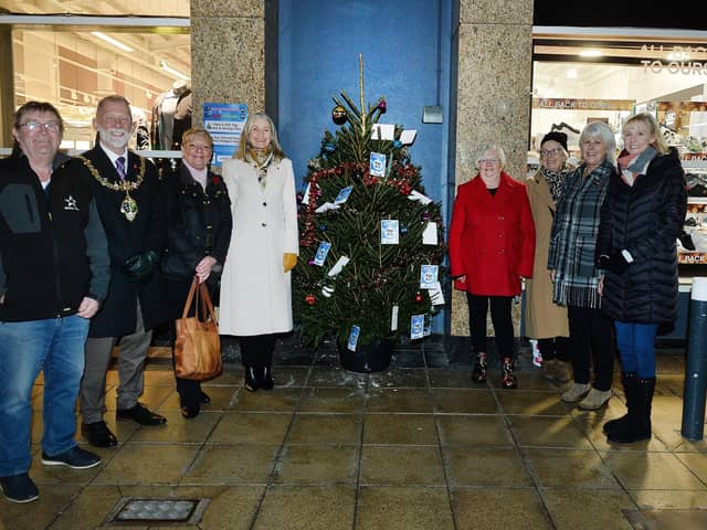 The launch of the Rotherham Toy Appeal took place at Parkgate Shopping. Pictured left to right are: Parkgate operations manager Billy Smith, the Mayor of Rotherham Cllr Robert Taylor, Parkgate Shopping manager Janet Drury, the Mayoress Tracy Taylor, appeal coordinator Ann Levick and her Christmas elves Jenny Mizon, Leigh Steggles and Katie Jewitt.