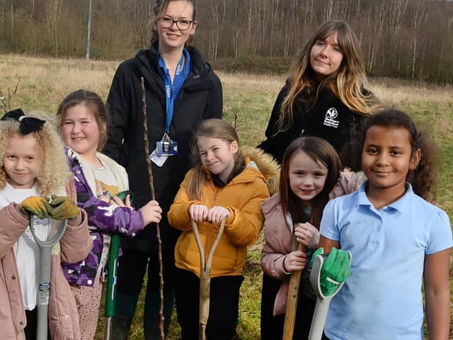 Canklow Wood Primary School pupils pictured with teacher Rhian Hulme (back left) and Rotherham and Sheffield Wildlife Trust outdoor learning assistant Scarlett Smithies - photo by Kerrie Beddows