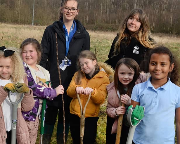 Canklow Wood Primary School pupils pictured with teacher Rhian Hulme (back left) and Rotherham and Sheffield Wildlife Trust outdoor learning assistant Scarlett Smithies - photo by Kerrie Beddows