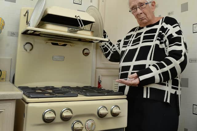 Val Marks with her New World Forty-Two cooker which has broken down after 65 years.