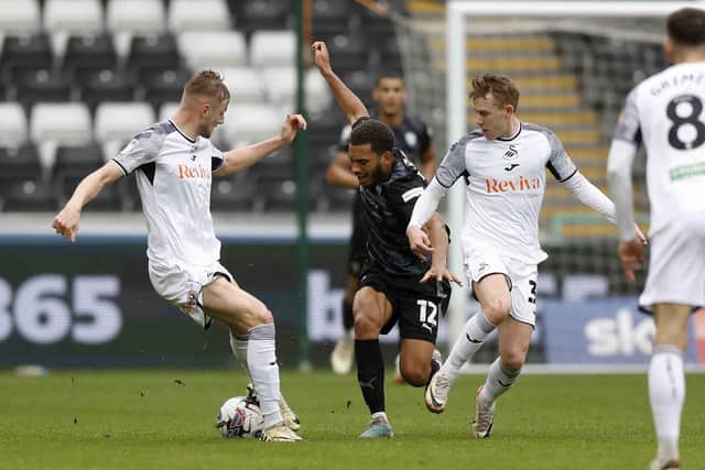 Andy Rinomhota battles in Rotherham United's cause at Swansea City today. Picture: Jim Brailsford