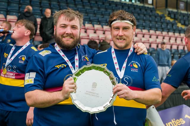 Wath's James Dobson and James Thompson shwoing off the silverware