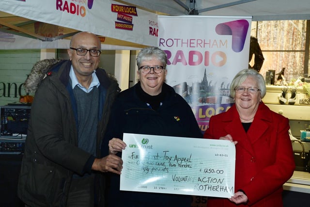 A cheque for £1,250 was presented to the Rotherham Toy Appeal by Voluntary Action Rotherham. Appeal coordinator Ann Levick (right) is seen receieving the cheque from VAR chief executive Shafiq Hussain and chairman Sarah Whittle.