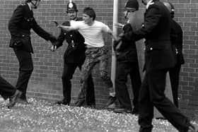STRIKE: Pickets and police face to face at Orgreave