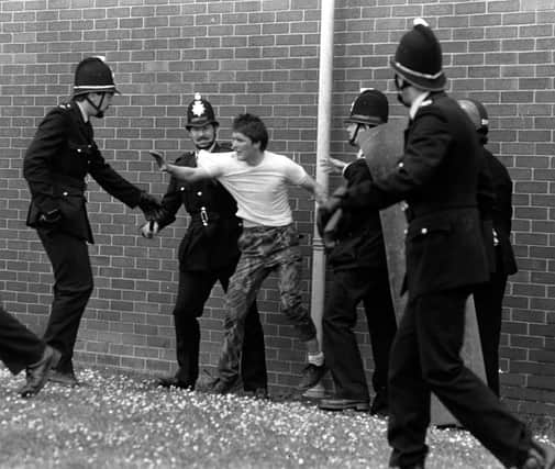 STRIKE: Pickets and police face to face at Orgreave